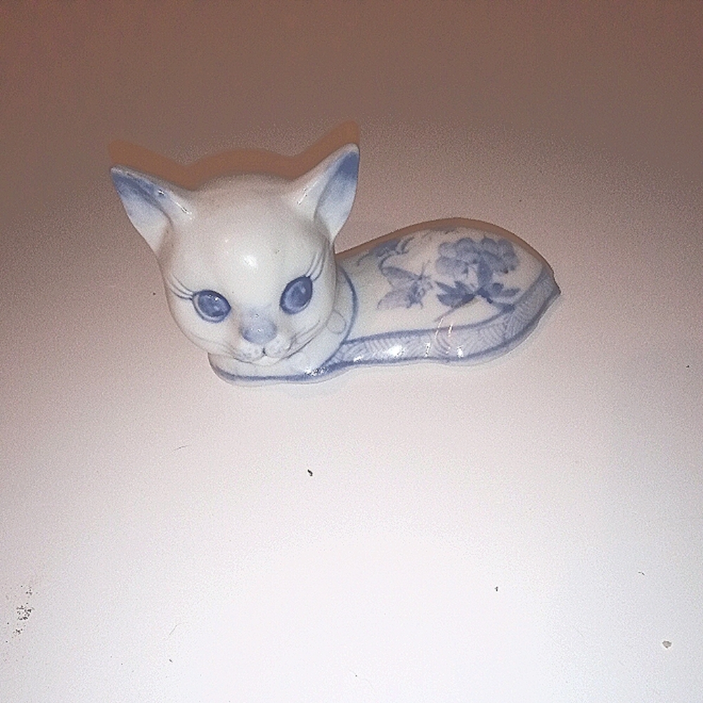 Vintage black and white painted cat